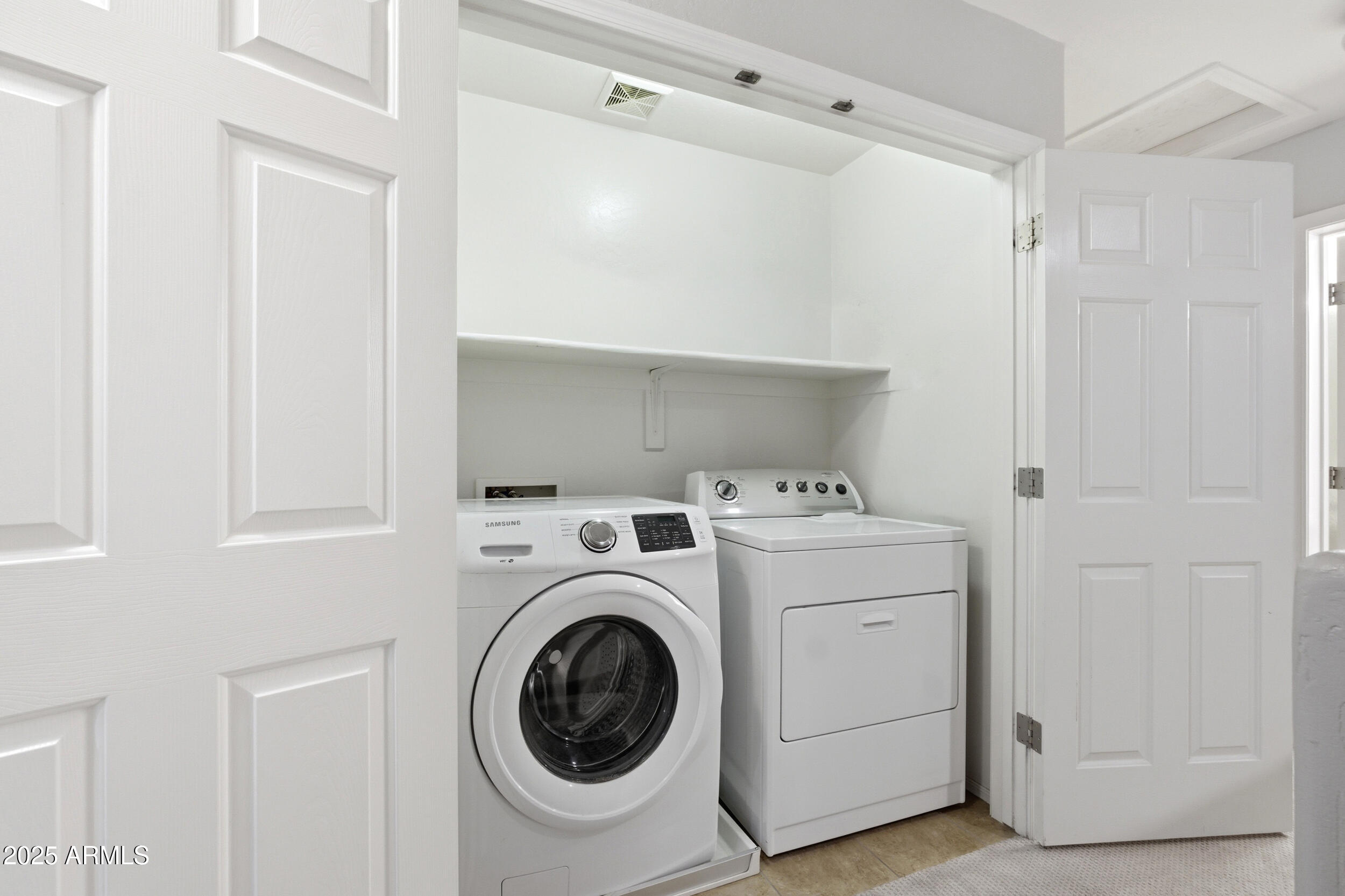 1255 South Rialto, Unit 162 Mesa, AZ 85209 - Photo 15 of 27 a utility room with dryer and washer