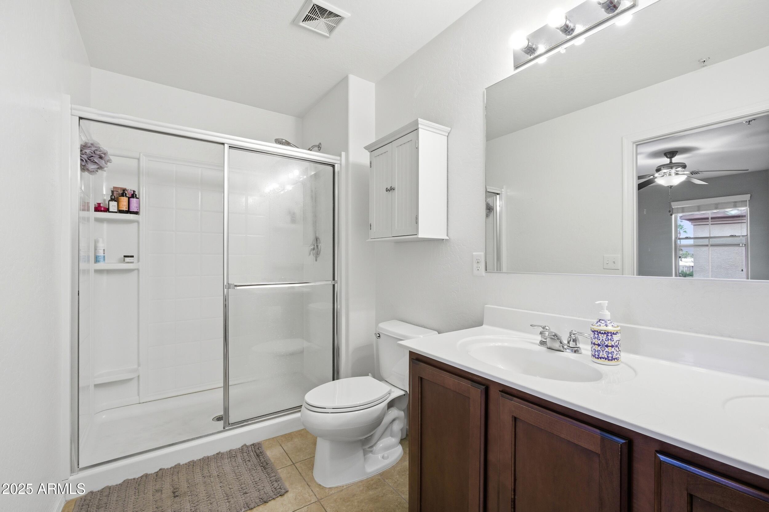 1255 South Rialto, Unit 162 Mesa, AZ 85209 - Photo 22 of 27 a bathroom with a sink toilet and shower