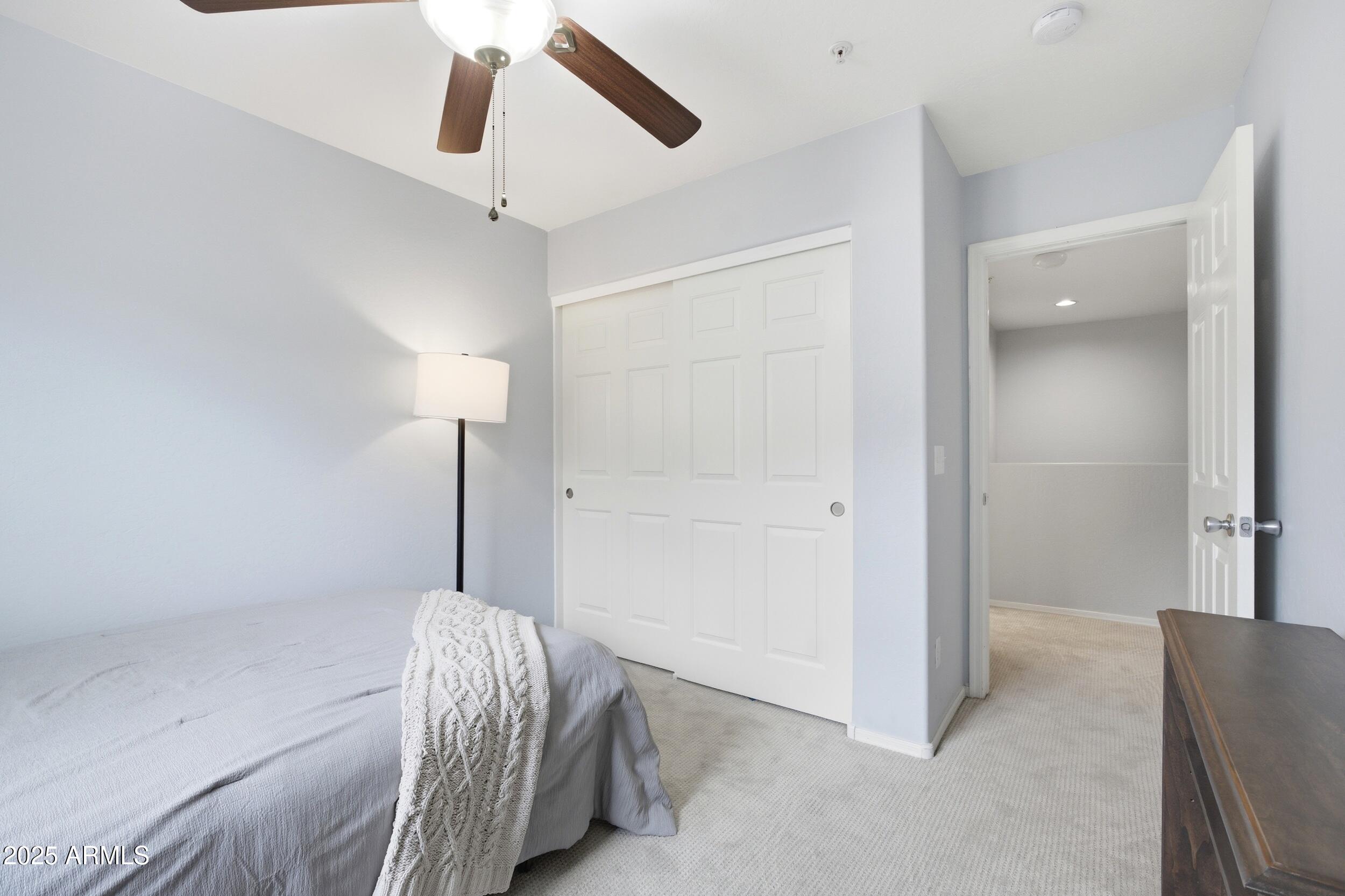 1255 South Rialto, Unit 162 Mesa, AZ 85209 - Photo 24 of 27 a living room with furniture and a window