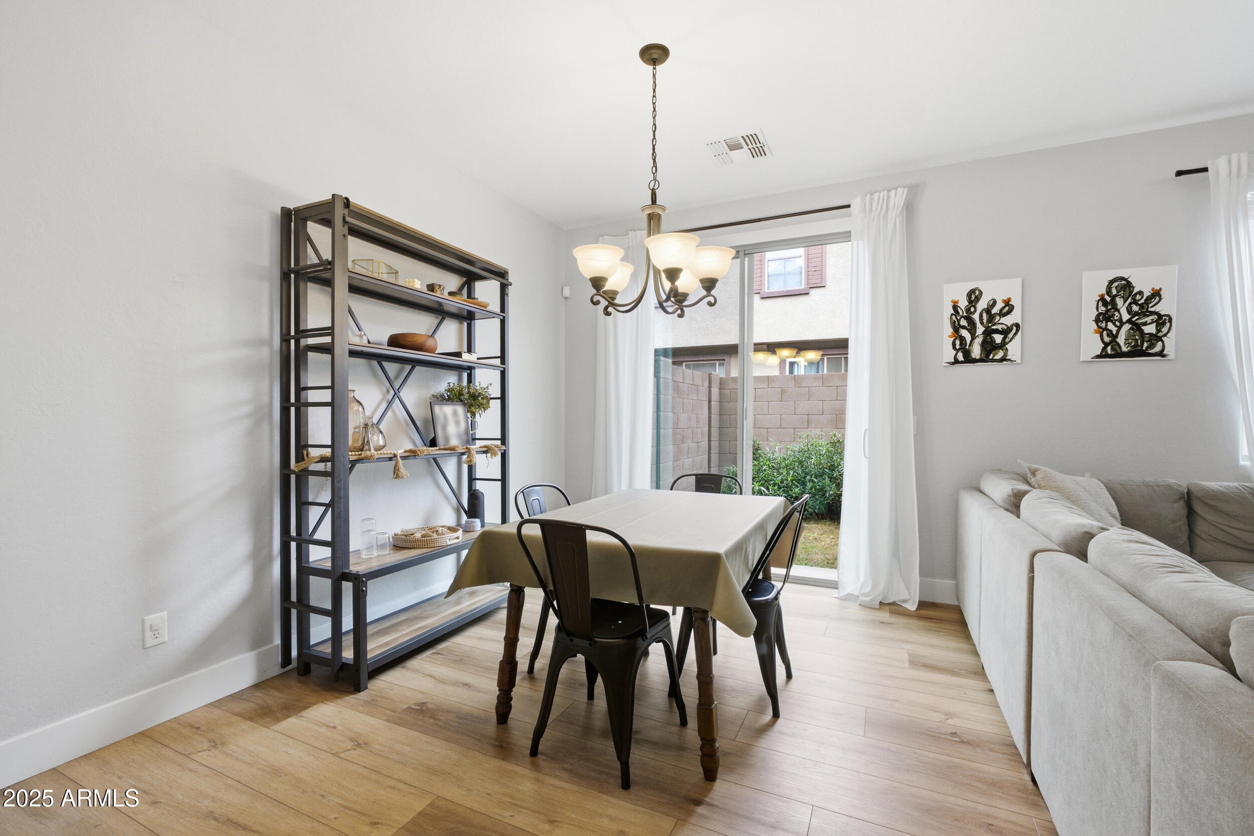 1255 South Rialto, Unit 162 Mesa, AZ 85209 - Photo 8 of 27 a view of a dining room with furniture window and outside view