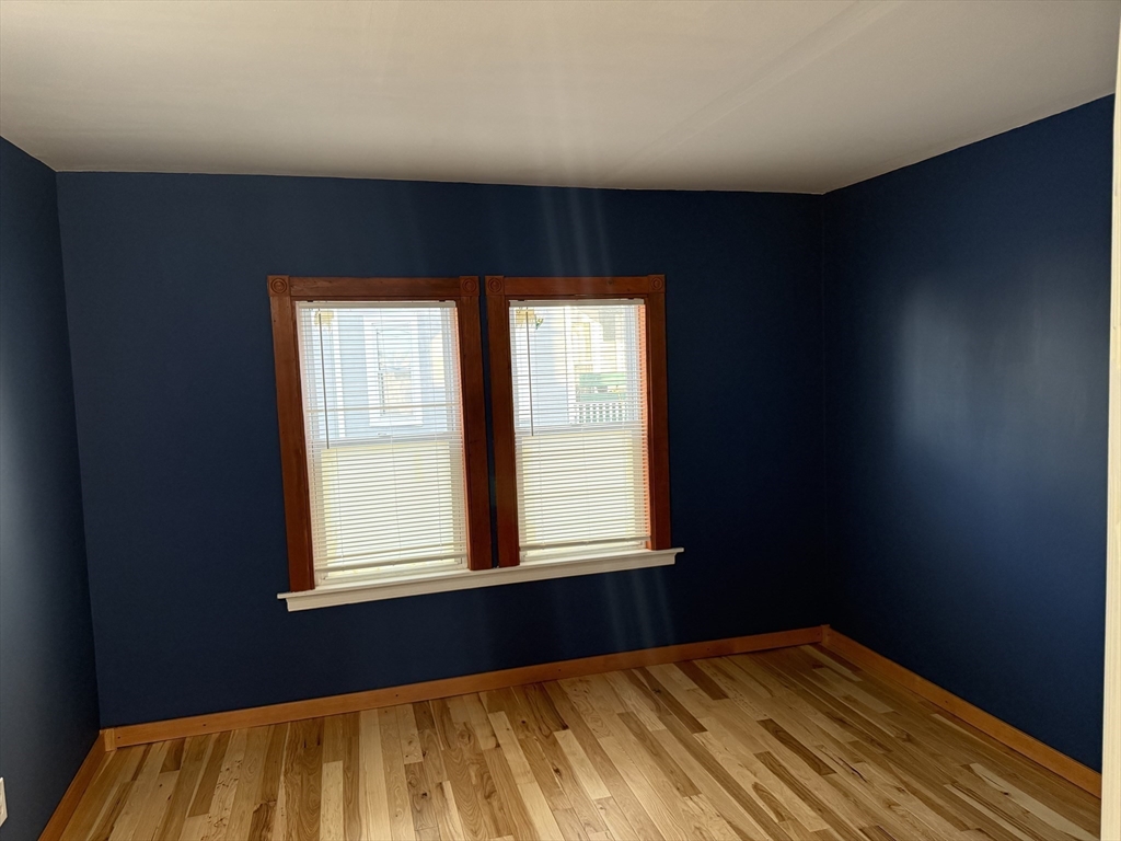 15 Acorn Street, Unit 1 Malden, MA 02148 - Photo 8 of 9 an empty room with a window