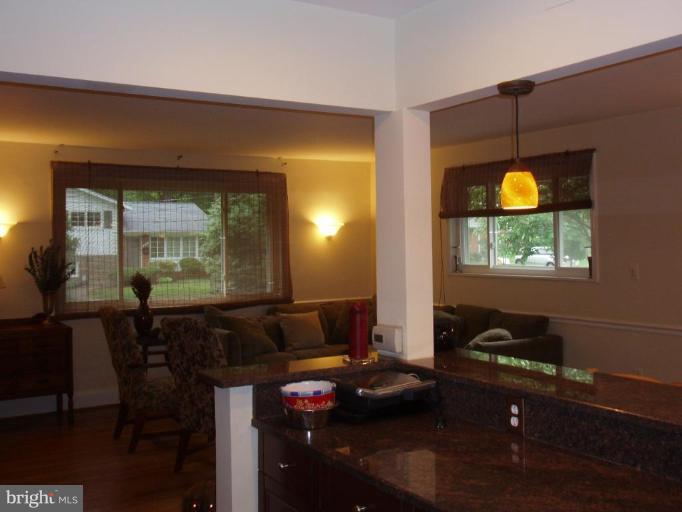 9720 Holmhurst Road Bethesda, MD 20817 - Photo 4 of 30 OPEN KITCHEN VIEW TO LV RM