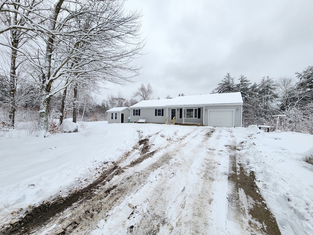 405 Queen Lake Road Phillipston, MA 01331 - Photo 3 of 25 a view of house with a yard
