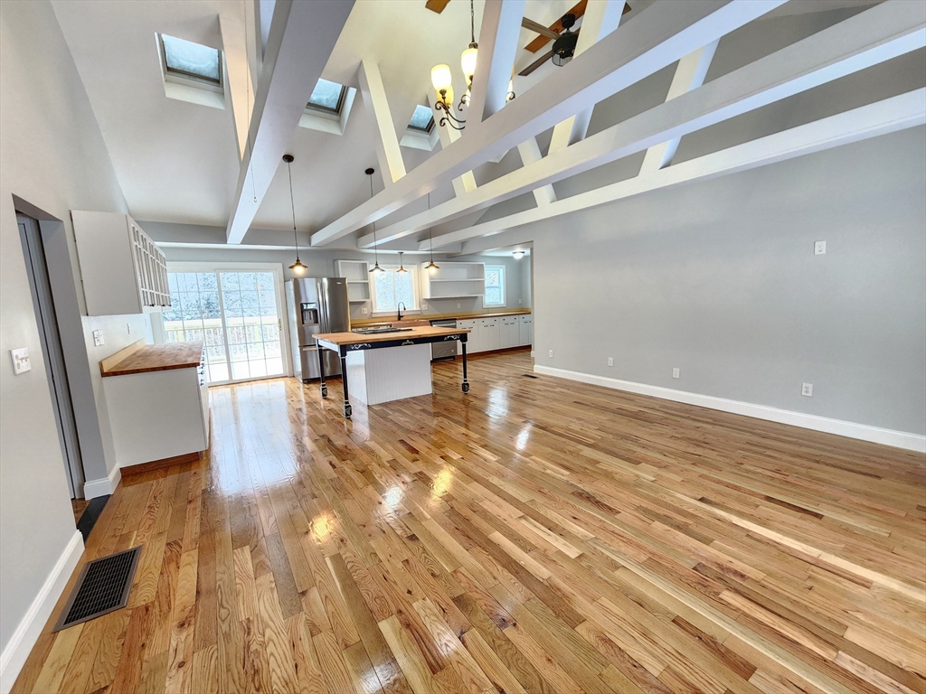 405 Queen Lake Road Phillipston, MA 01331 - Photo 6 of 25 a view of a room with wooden floor