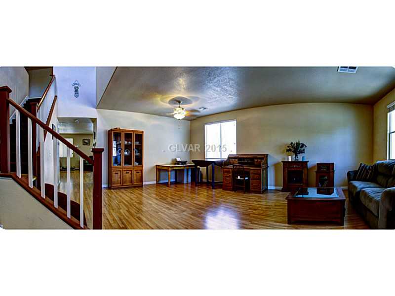 7905 Midnight Ride Street Las Vegas, NV 89131 - Photo 3 of 23 Living Room.