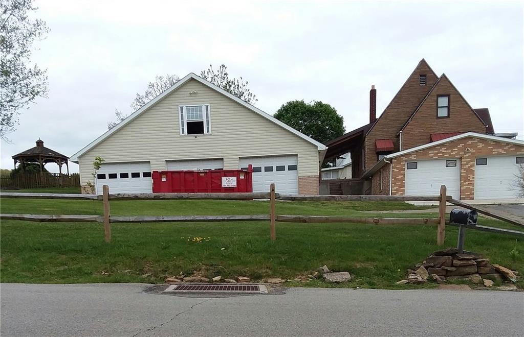 503 West Main Street Rural Valley, PA 16249 - Photo 3 of 24 Side street view of 3 bay garage and 2 car garage