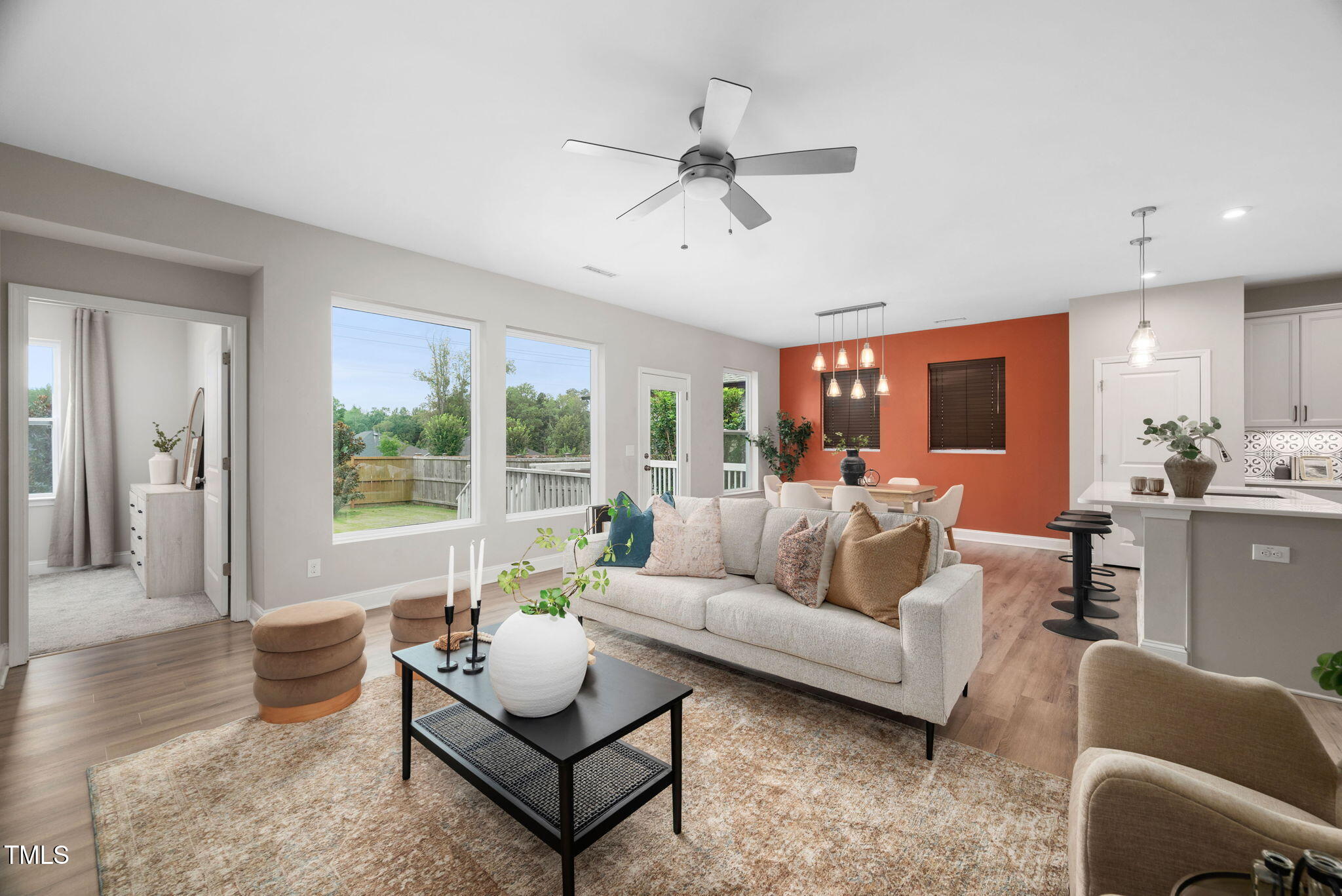 1821 Cypress Cove Drive Wendell, NC 27591 - Photo 11 of 31 a living room with furniture and a large window