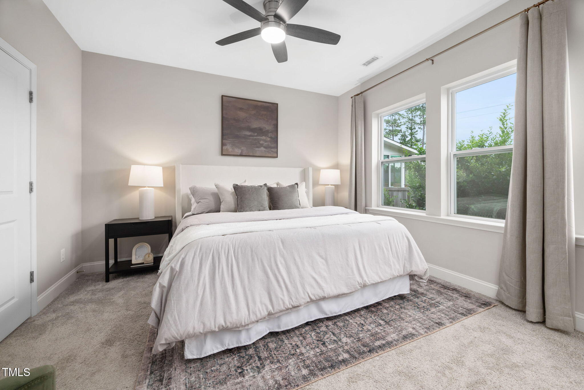 1821 Cypress Cove Drive Wendell, NC 27591 - Photo 14 of 31 a bedroom with a bed and window