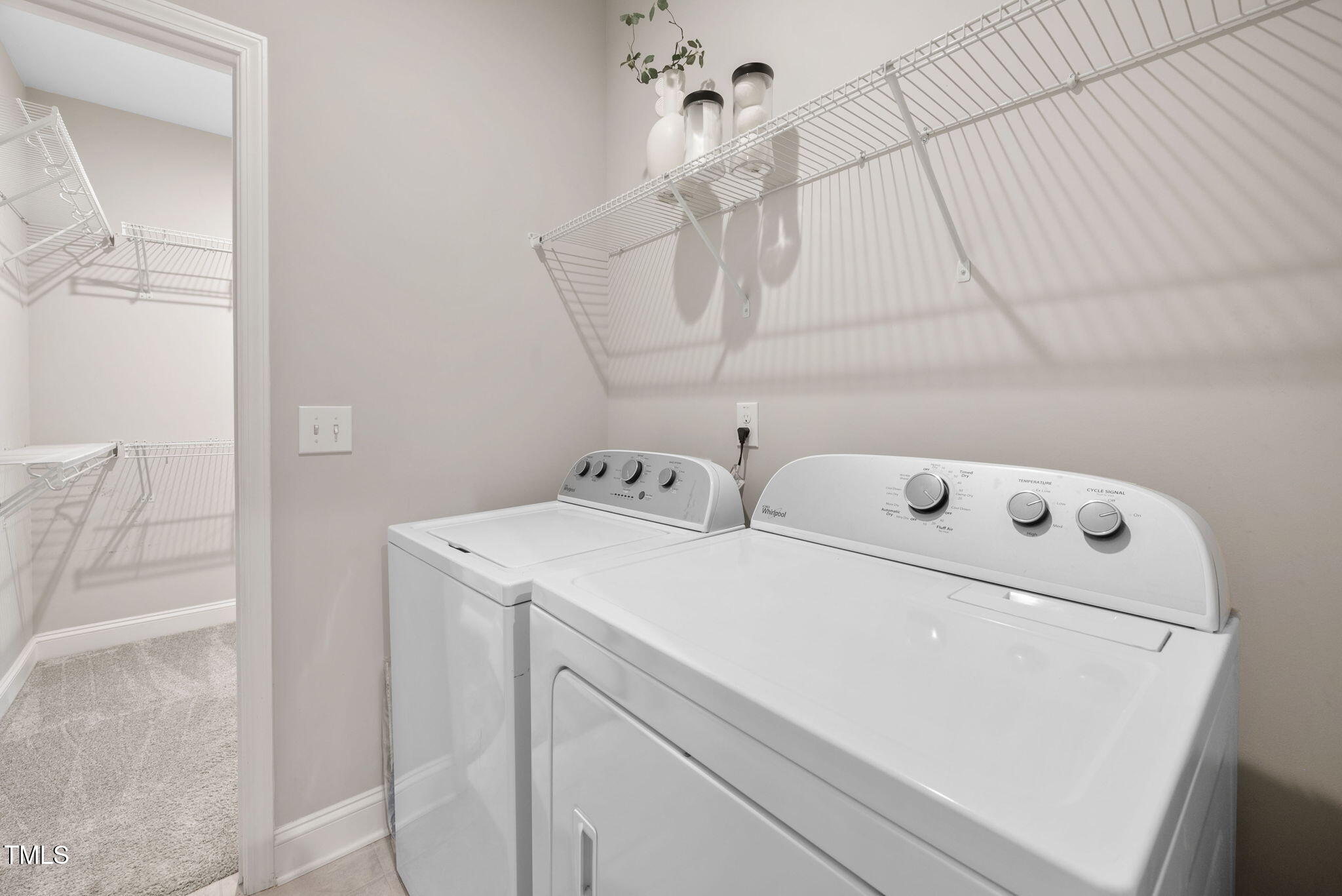 1821 Cypress Cove Drive Wendell, NC 27591 - Photo 19 of 31 a utility room with dryer and washer