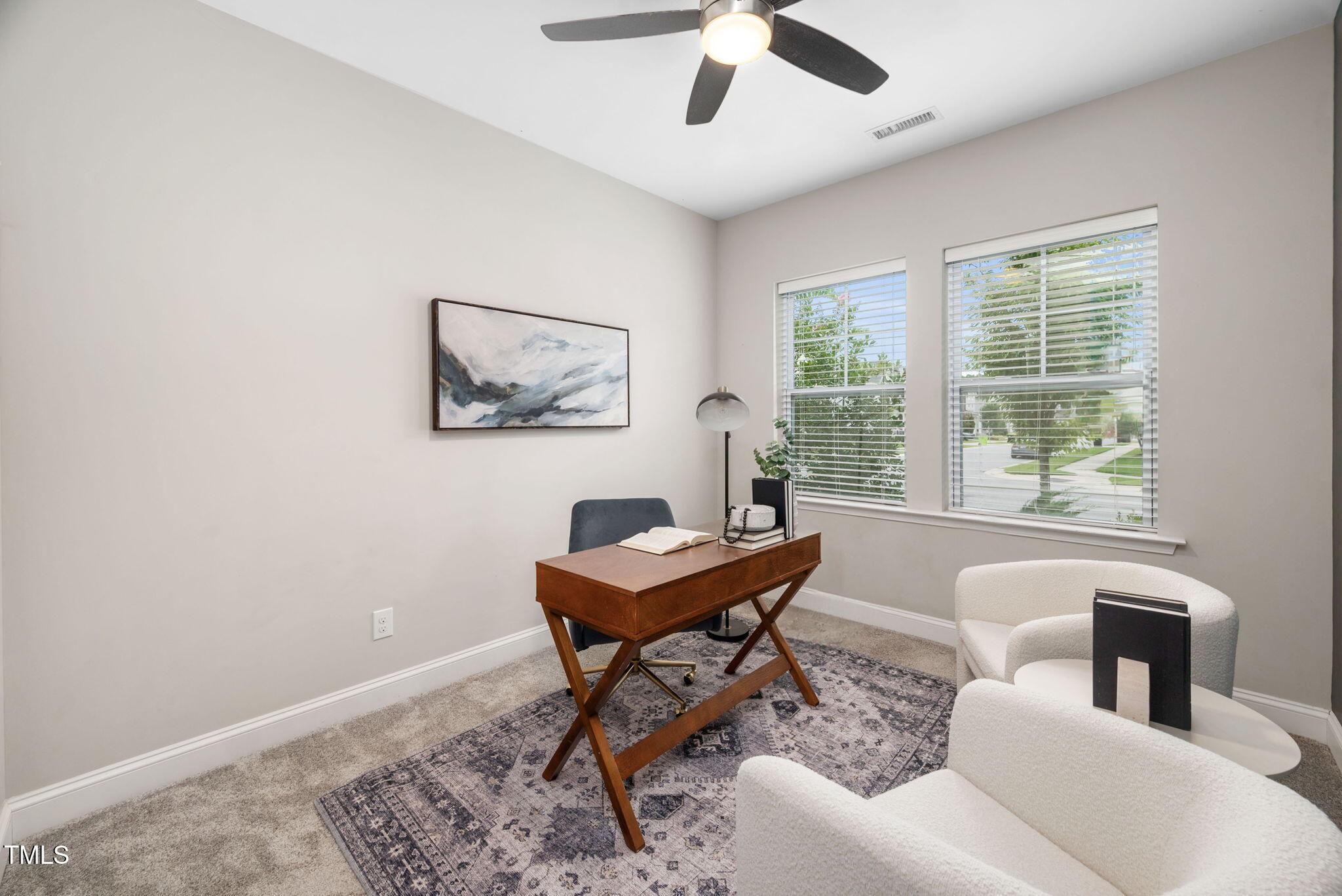 1821 Cypress Cove Drive Wendell, NC 27591 - Photo 22 of 31 a living room with furniture and a window