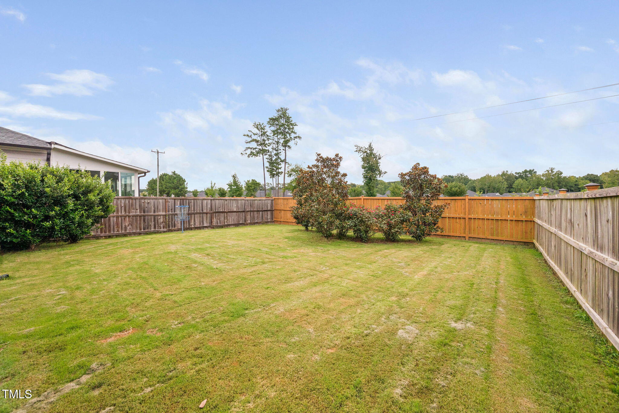 1821 Cypress Cove Drive Wendell, NC 27591 - Photo 26 of 31 a view of a swimming pool and an outdoor seating