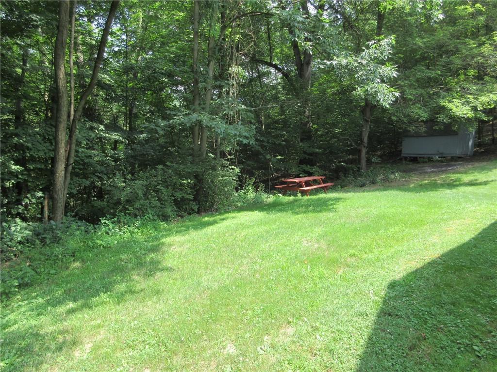 119 Shaffer Road Beaver Falls, PA 15010 - Photo 19 of 20 a backyard of a house with seating space