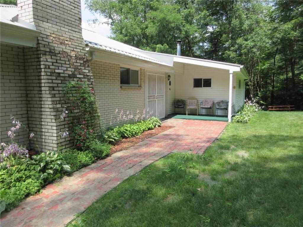 119 Shaffer Road Beaver Falls, PA 15010 - Photo 3 of 20 a front view of a house with yard and green space