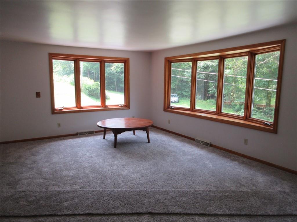 119 Shaffer Road Beaver Falls, PA 15010 - Photo 8 of 20 a living room with furniture and a window