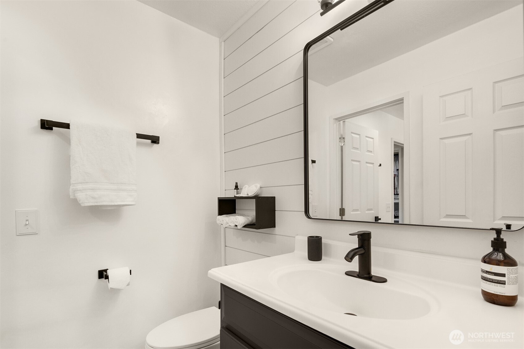 12 18th Avenue, Unit A Kirkland, WA 98033 - Photo 19 of 29 a bathroom with a sink and a mirror