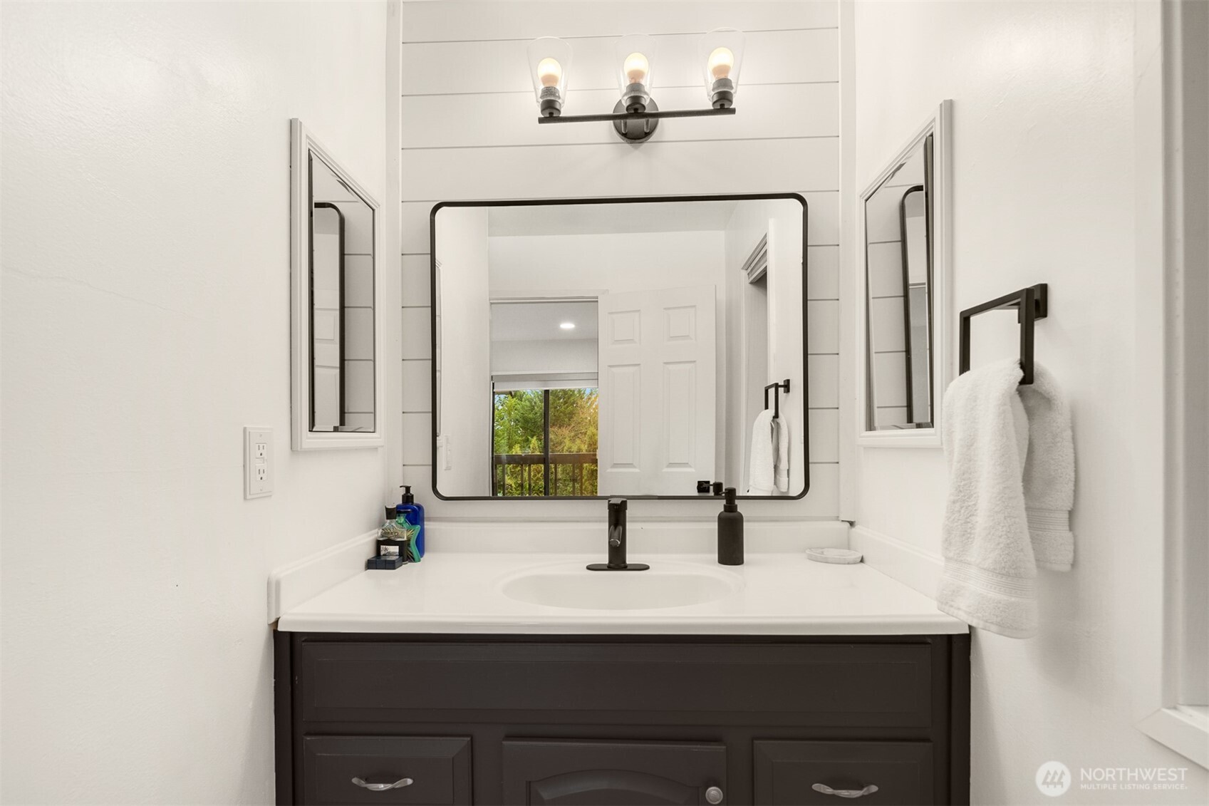 12 18th Avenue, Unit A Kirkland, WA 98033 - Photo 21 of 29 a bathroom with a sink and a mirror