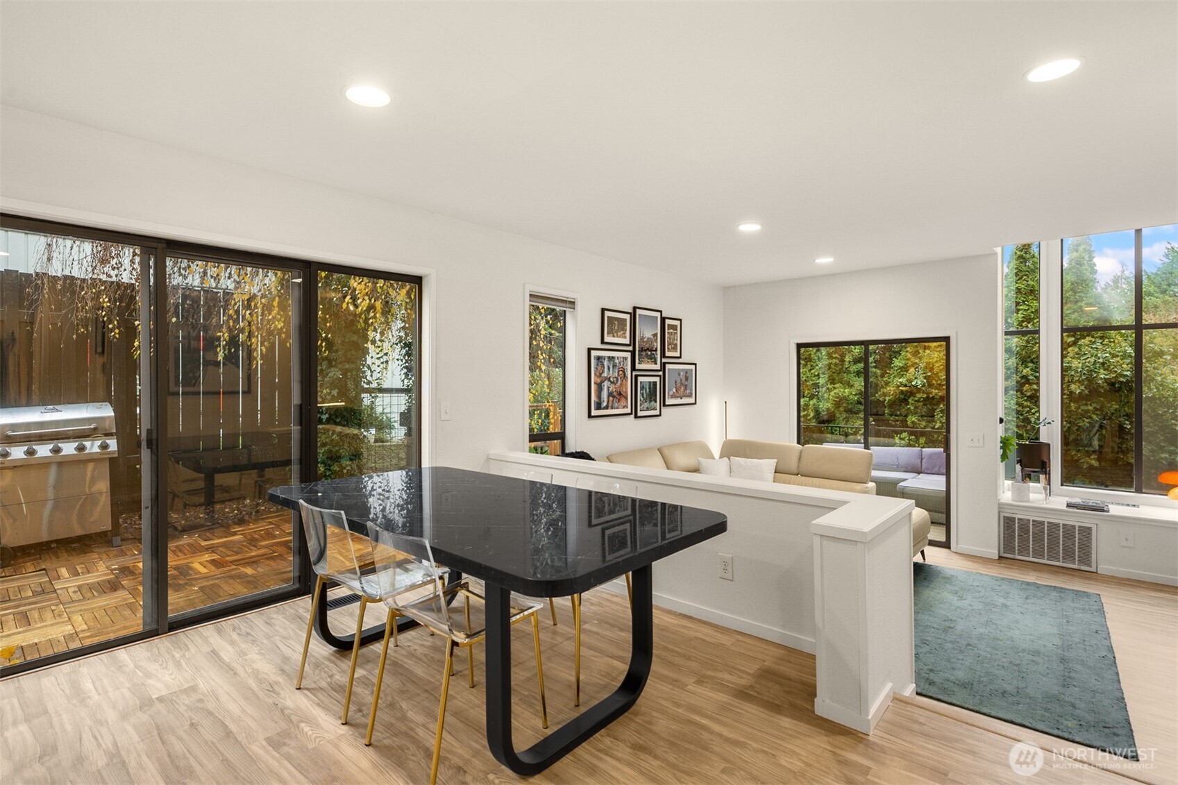 12 18th Avenue, Unit A Kirkland, WA 98033 - Photo 7 of 29 a view of a dining room with furniture window and outside view