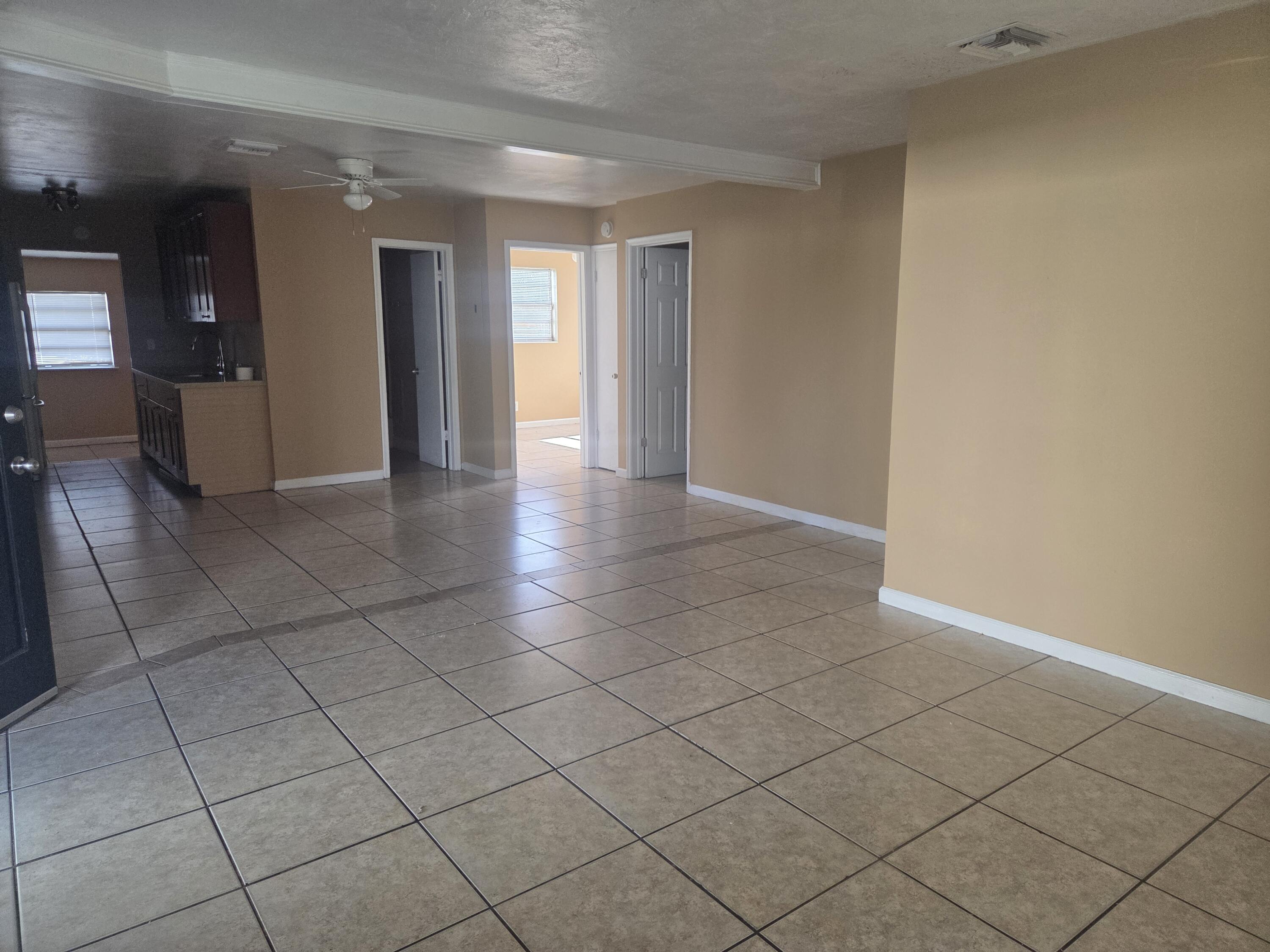 1509 Pine Tree Court Riviera Beach, FL 33404 - Photo 2 of 17 a view of livingroom with natural light