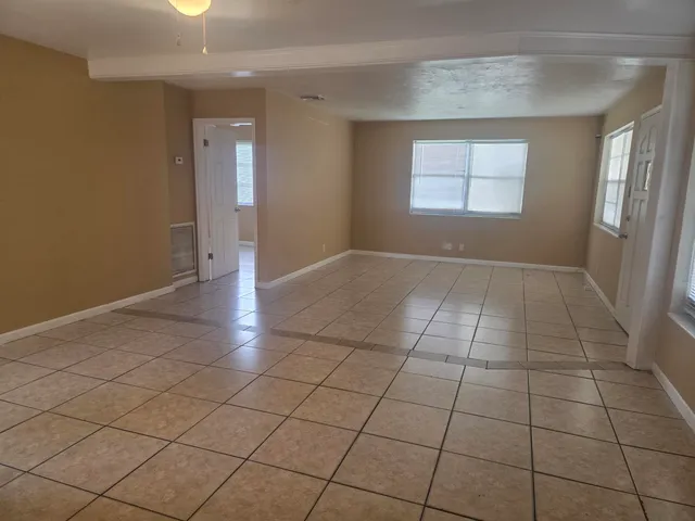 a view of an empty room and window