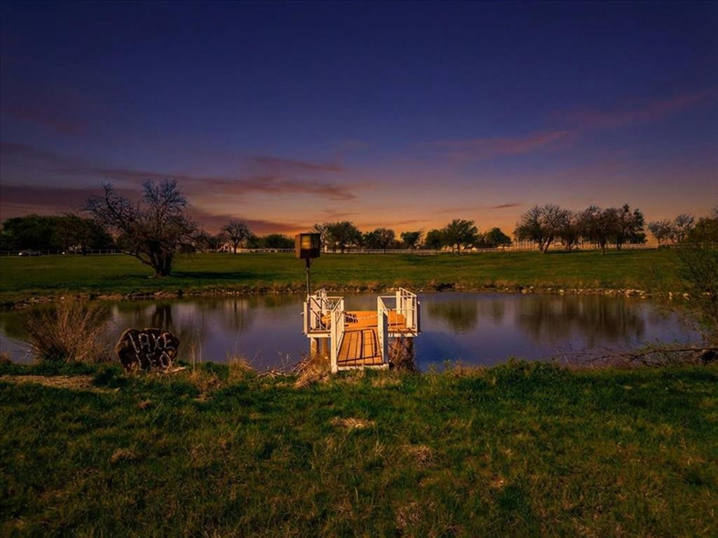 11918 Riek Road Krum, TX 76249 - Photo 5 of 40 a lake view with a city view