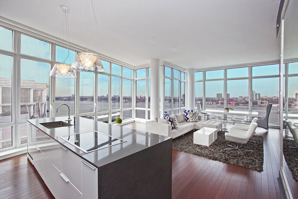 60 Riverside Boulevard, Unit 2011 Manhattan, NY 10069 - Photo 2 of 16 a living room with furniture and a large window