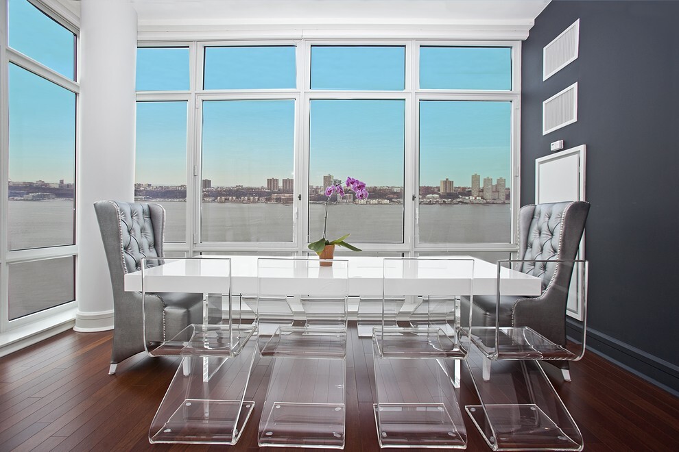60 Riverside Boulevard, Unit 2011 Manhattan, NY 10069 - Photo 3 of 16 a view of a dining room with furniture a chandelier and wooden floor
