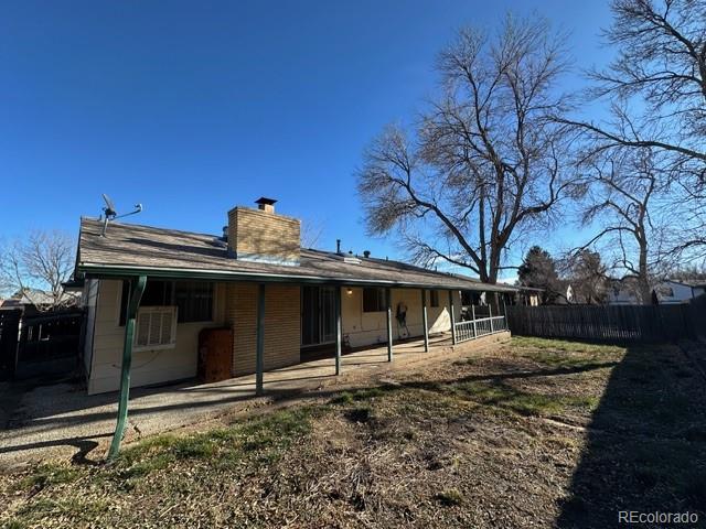 8191 Everett Way Arvada, CO 80005 - Photo 17 of 18 a view of a house with large windows