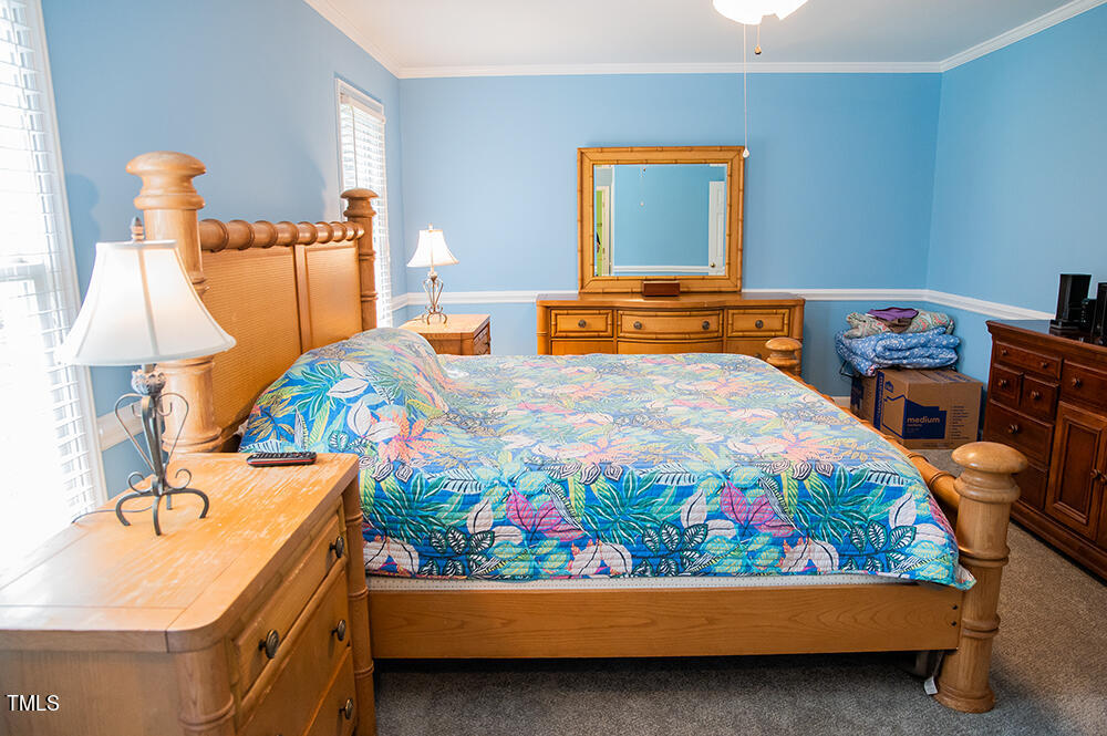 46 Beaver Crossing Road Roxboro, NC 27574 - Photo 17 of 50 a bedroom with a bed and dresser