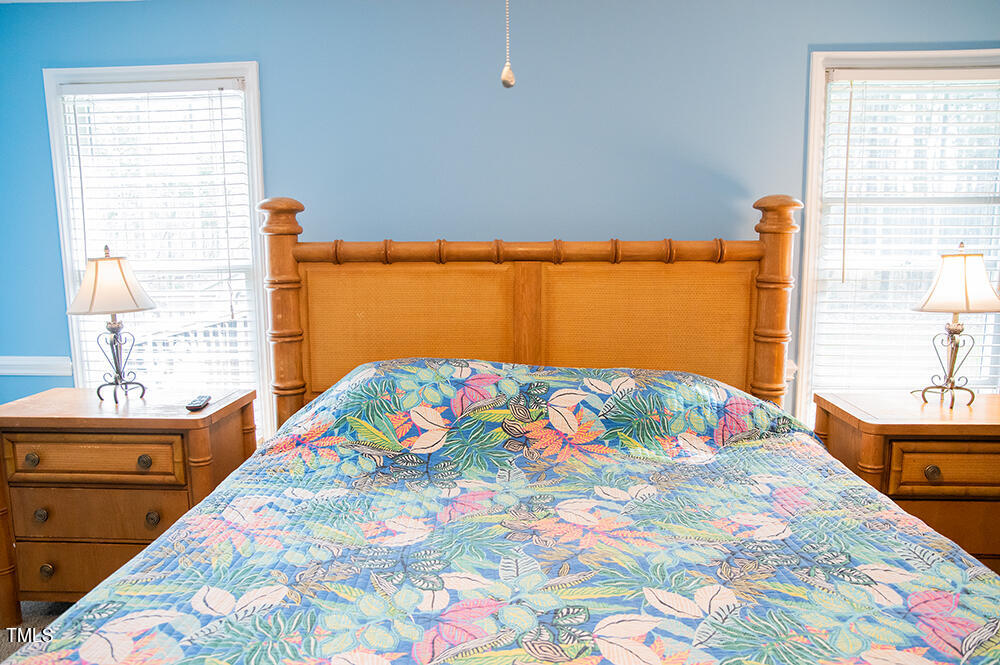 46 Beaver Crossing Road Roxboro, NC 27574 - Photo 19 of 50 a bedroom with a bed and window