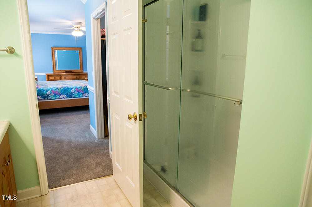 46 Beaver Crossing Road Roxboro, NC 27574 - Photo 25 of 50 a view of a bedroom from a bathroom