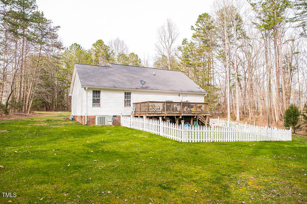 46 Beaver Crossing Road Roxboro, NC 27574 - Photo 44 of 50 a view of house with backyard and outdoor seating