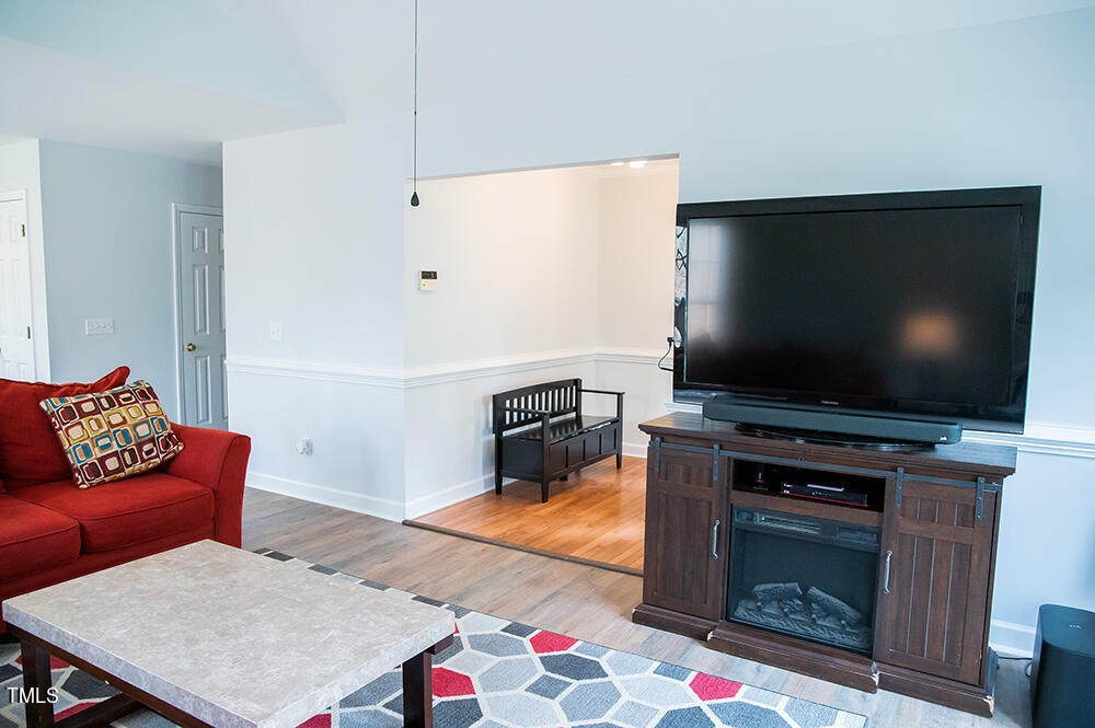 46 Beaver Crossing Road Roxboro, NC 27574 - Photo 5 of 50 a living room with furniture and a flat screen tv