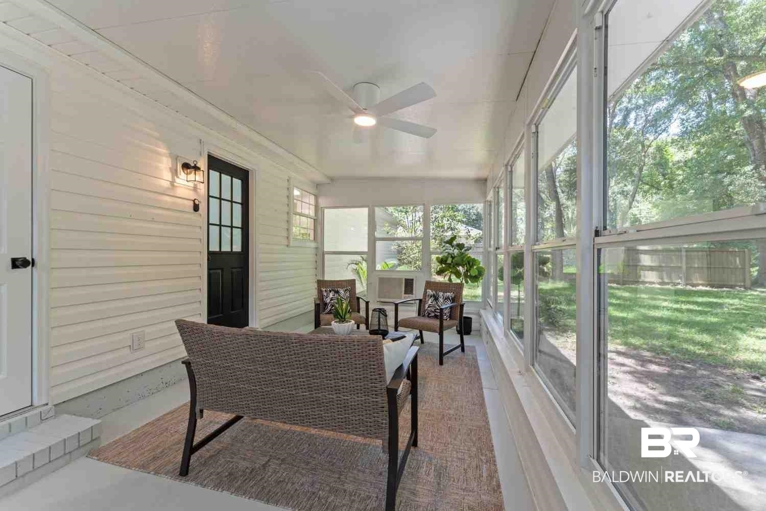 10251 Windmill Road Fairhope, AL 36532 - Photo 38 of 44 Sunroom / solarium featuring ceiling fan and an outdoor living space