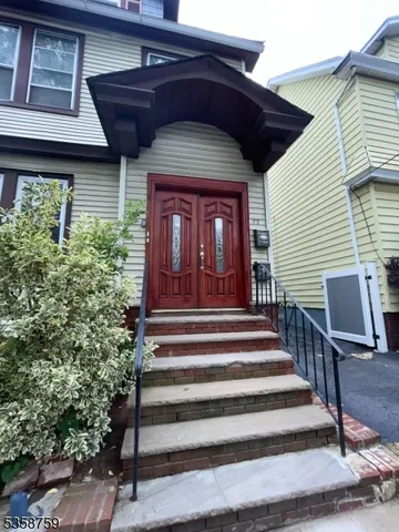 a front view of a house with entryway