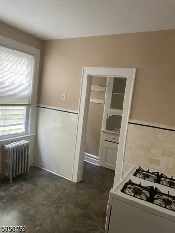 a room with furniture and a window