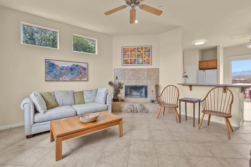 3431 Santa Saba Road Borrego Springs, CA 92004 - Photo 5 of 23 a living room with furniture and a fireplace