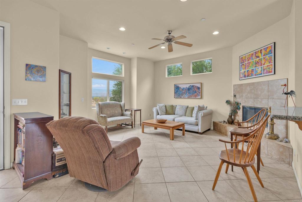 3431 Santa Saba Road Borrego Springs, CA 92004 - Photo 7 of 23 a living room with furniture and a chandelier