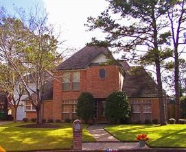 14614 Ridgechase Lane Houston, TX 77014 - Photo 1 of 3 a view of a house with a swimming pool