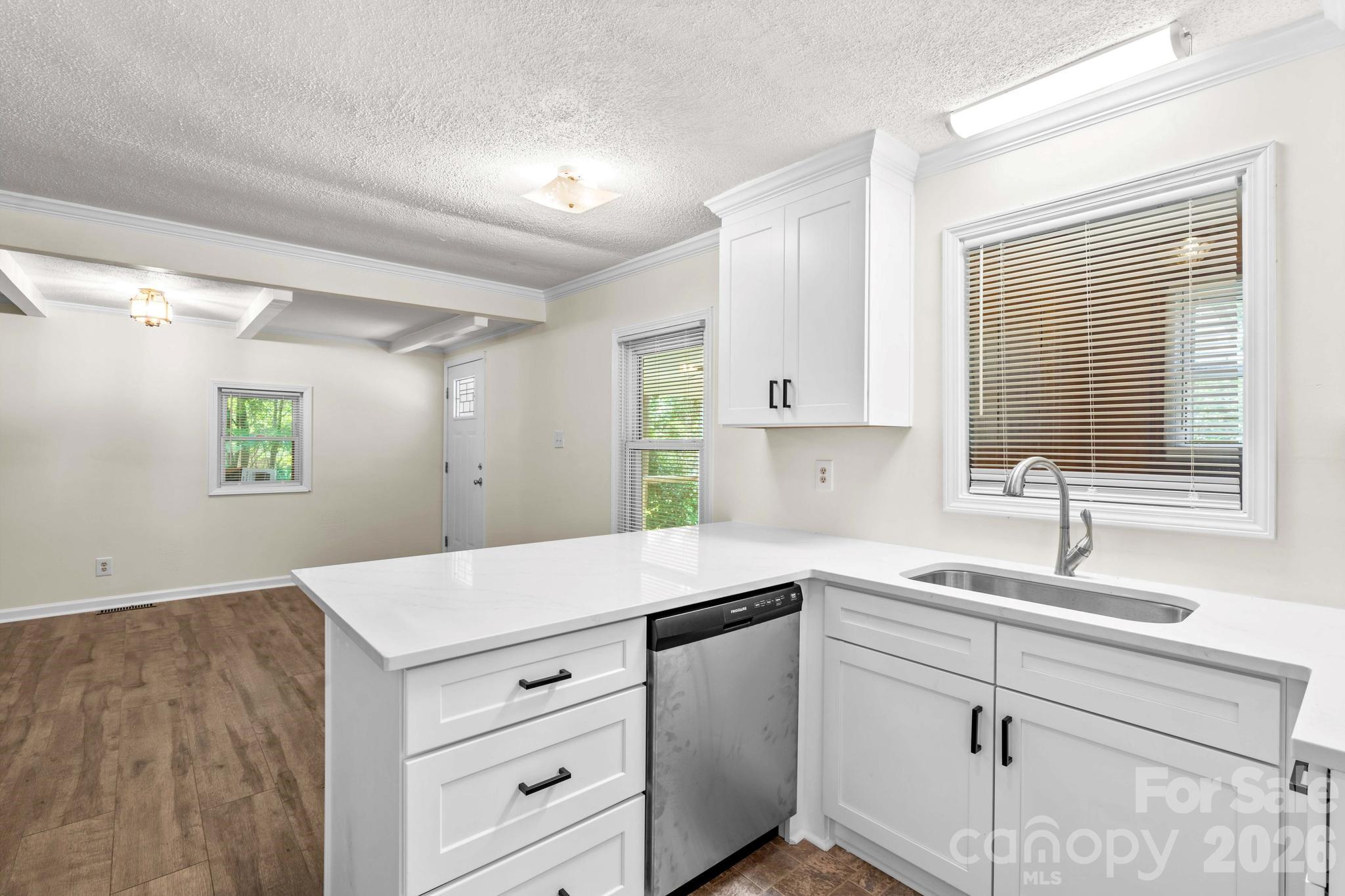 835 Maple Avenue Salisbury, NC 28144 - Photo 17 of 48 a kitchen with a sink and a window