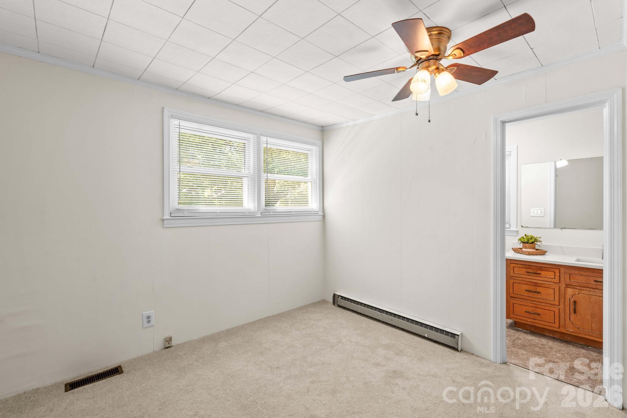 835 Maple Avenue Salisbury, NC 28144 - Photo 20 of 48 wooden floor in an empty room with a window