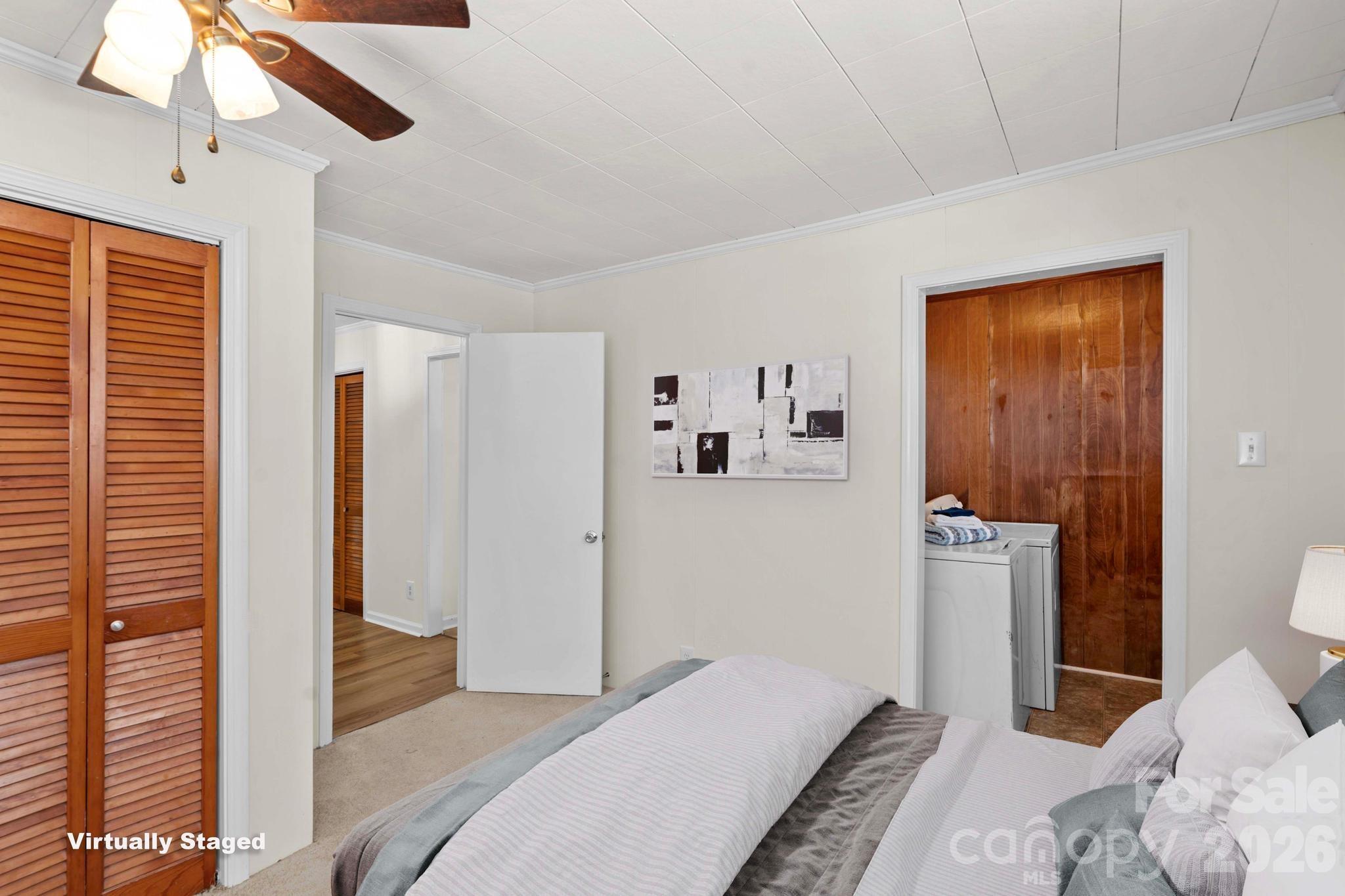 835 Maple Avenue Salisbury, NC 28144 - Photo 21 of 48 a bedroom with bed and walk in closet