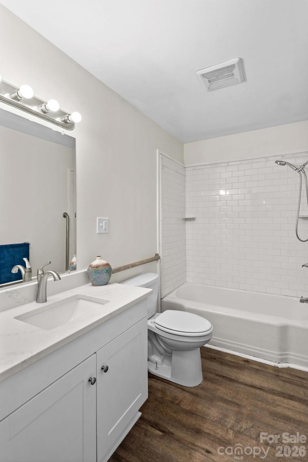 835 Maple Avenue Salisbury, NC 28144 - Photo 29 of 48 a bathroom with a sink a toilet and shower