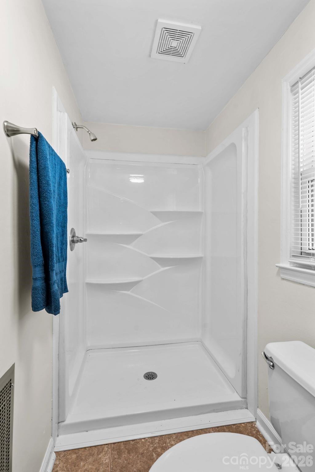 835 Maple Avenue Salisbury, NC 28144 - Photo 30 of 48 a bathroom with a shower and a toilet