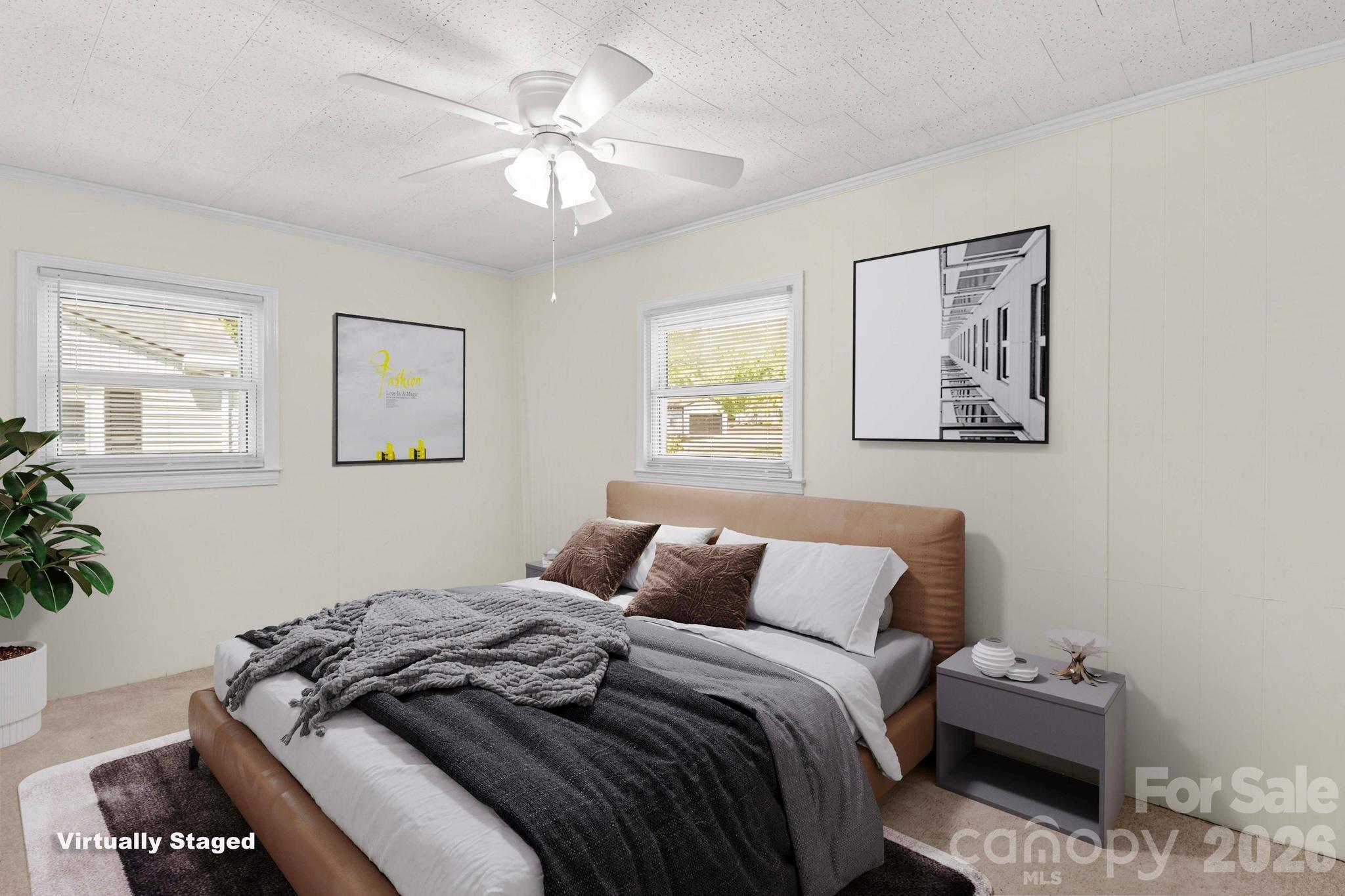 835 Maple Avenue Salisbury, NC 28144 - Photo 31 of 48 a bedroom with a bed and a chandelier