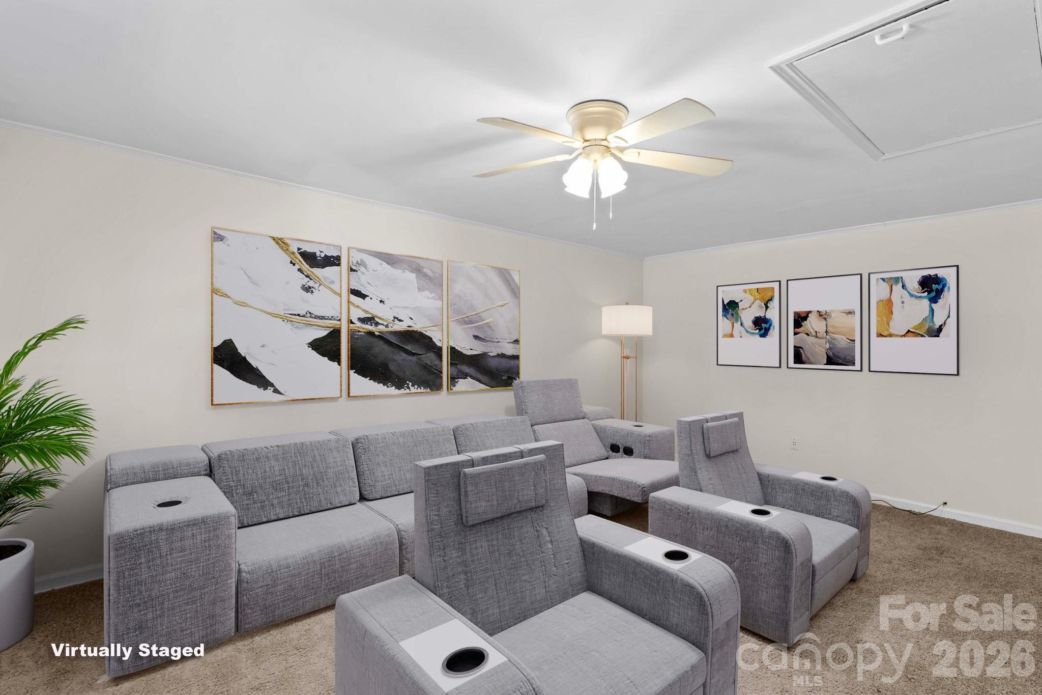835 Maple Avenue Salisbury, NC 28144 - Photo 35 of 48 a living room with furniture and a chandelier
