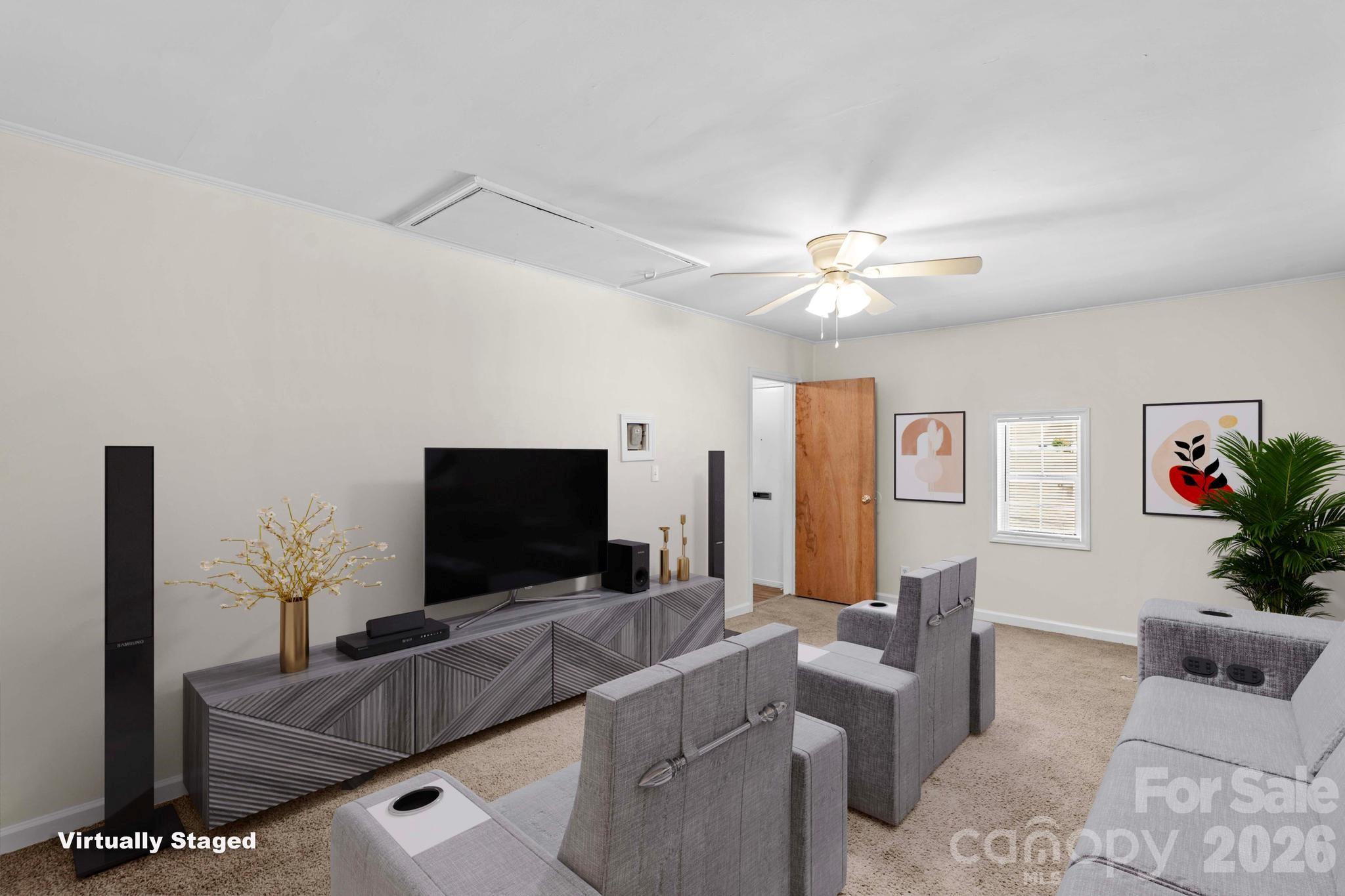 835 Maple Avenue Salisbury, NC 28144 - Photo 37 of 48 a living room with furniture and a flat screen tv