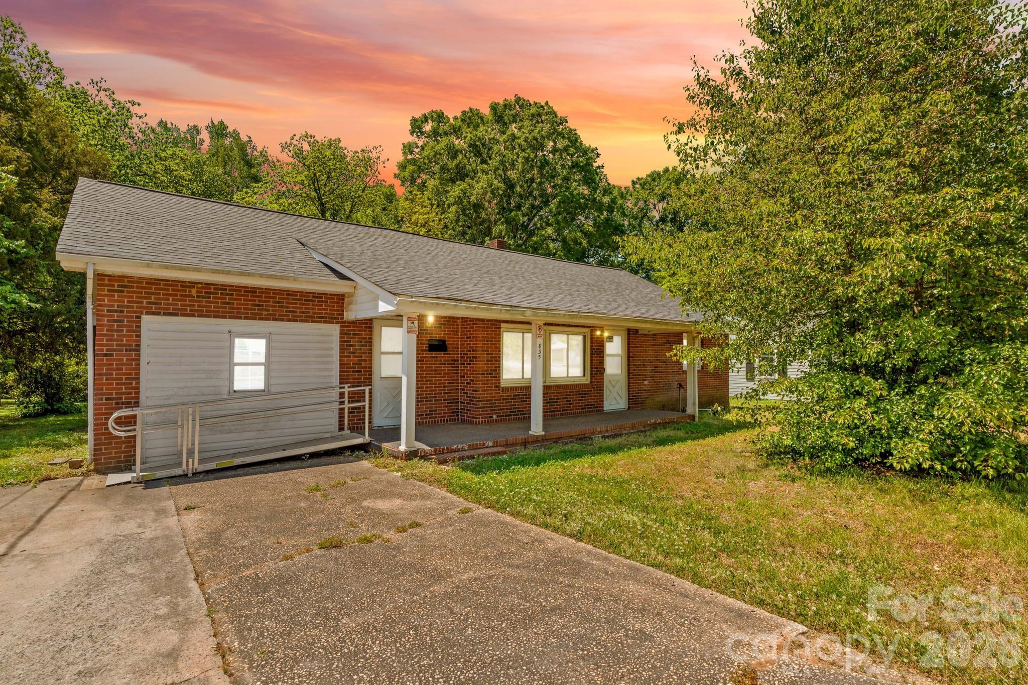 835 Maple Avenue Salisbury, NC 28144 - Photo 4 of 48 a front view of a house with a yard