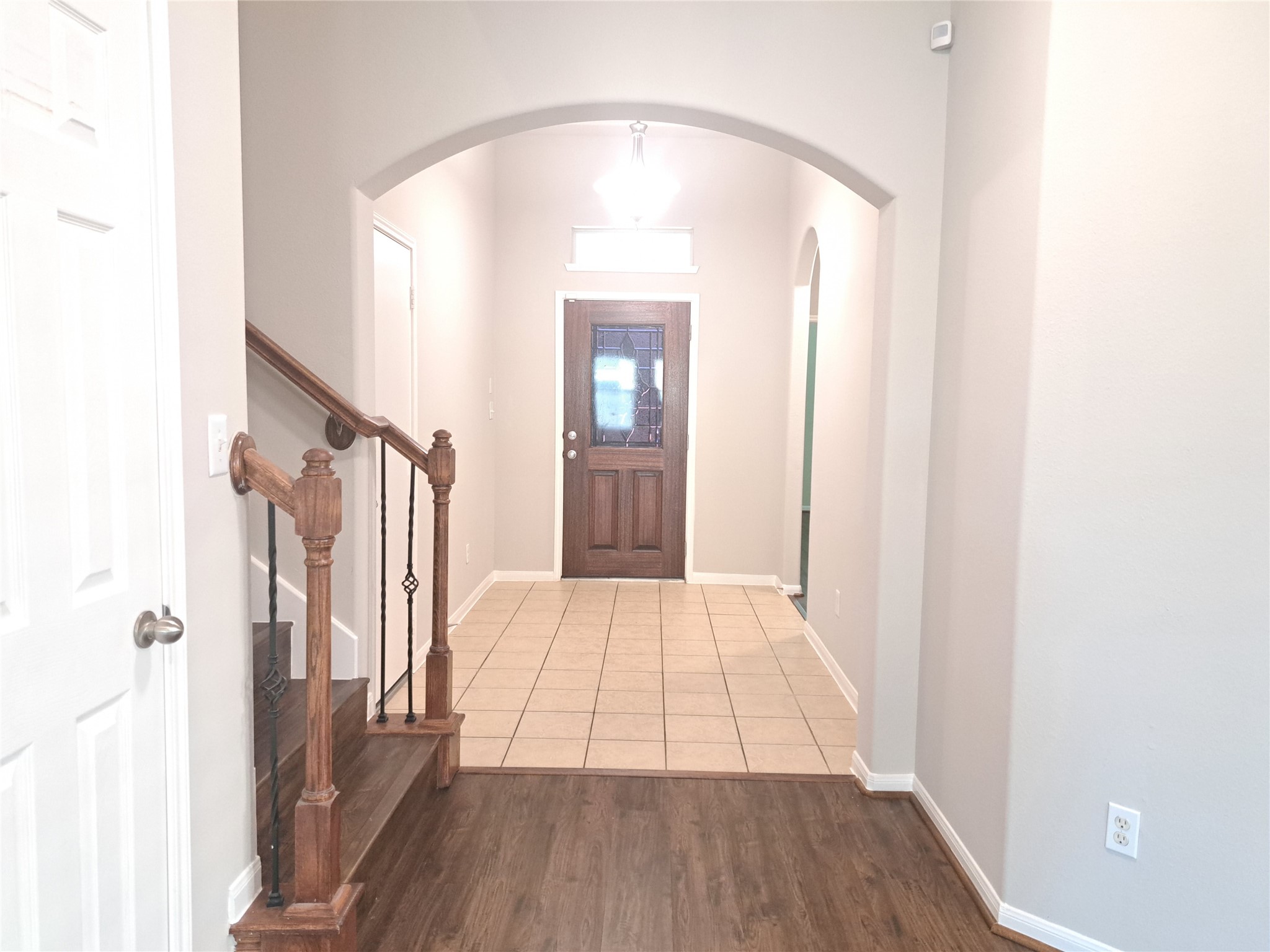 26315 Fox Ridge Lane Katy, TX 77494 - Photo 5 of 39 a view of a hallway view with wooden floor and staircase