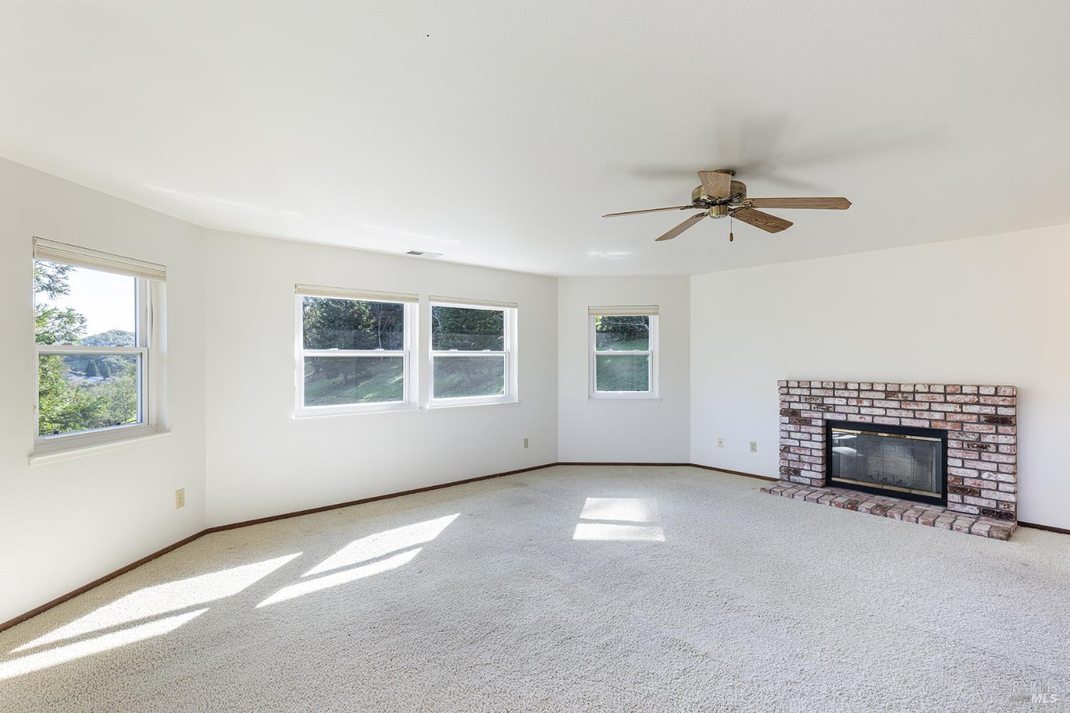 324 Burgundy Road Healdsburg, CA 95448 - Photo 7 of 52 Spacious Primary suite with wood burning fireplace.