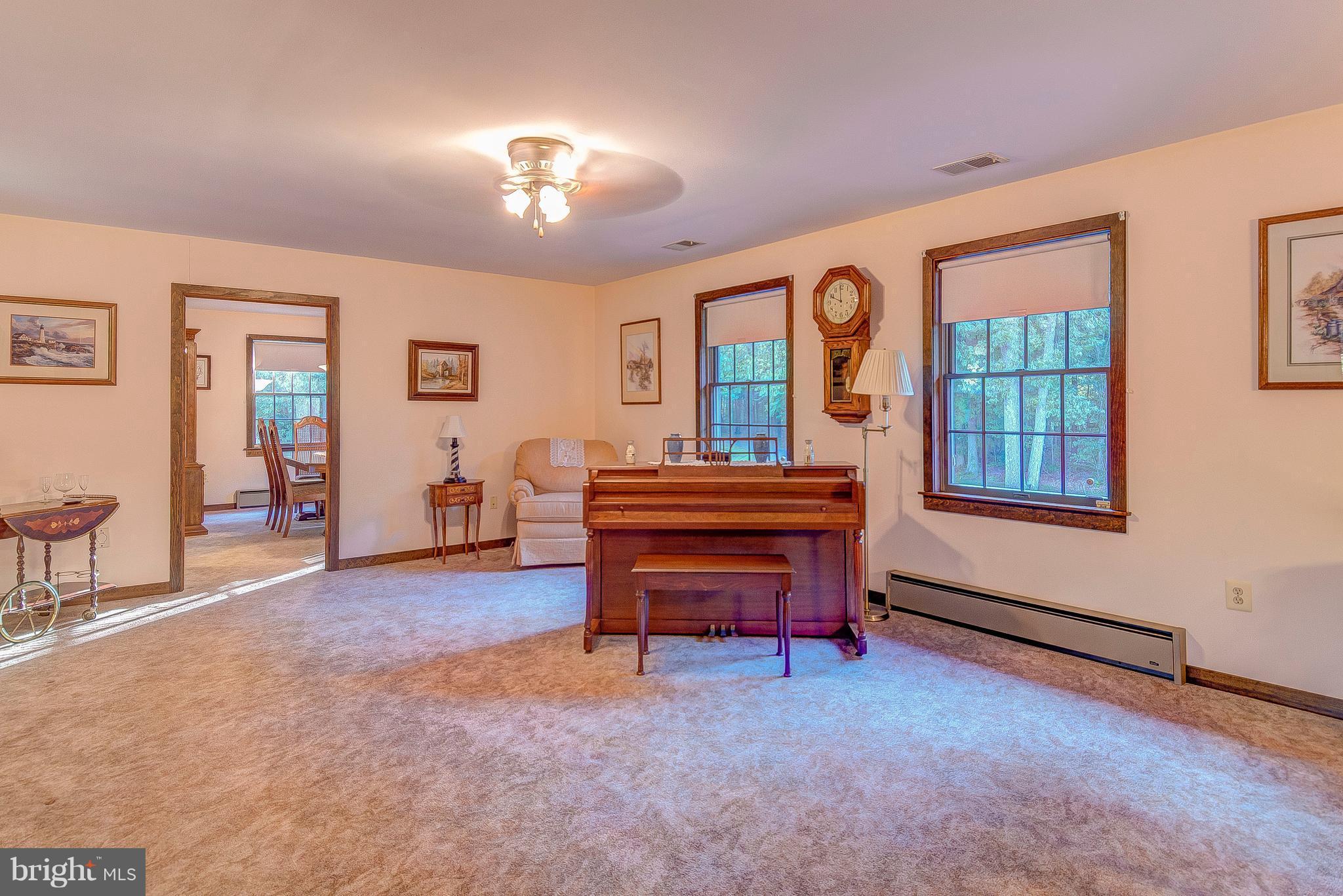5966 Tyler Road Deale, MD 20751 - Photo 16 of 30 a living room with furniture and a piano